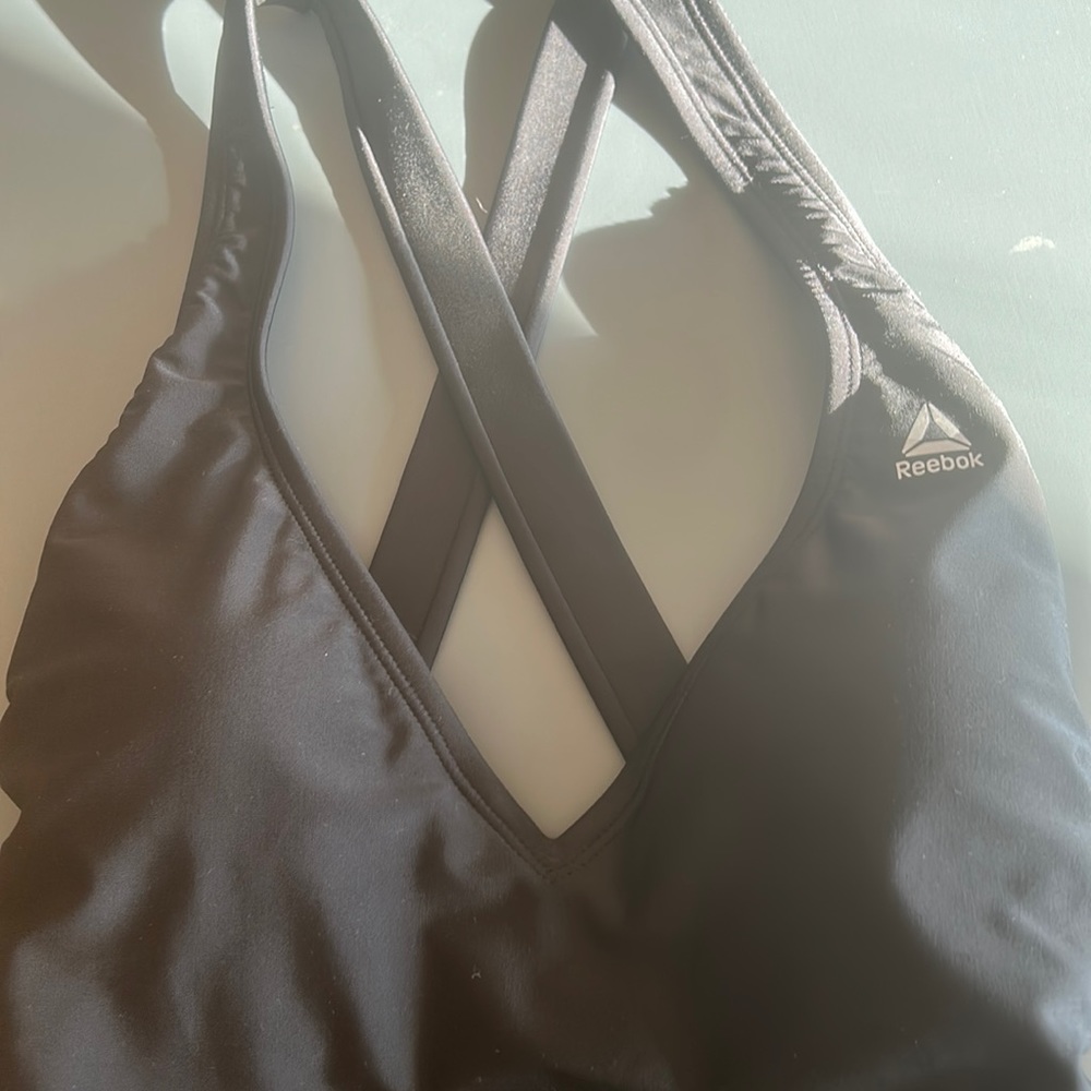 Bnwt size small Reebok cross back swimsuit.
